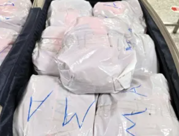 New York man arrested after CBP officers seize 65 pounds of khat in passenger baggage at Dulles Airport